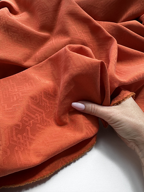 картинка Плательный жаккардовый шелк от Hermes в оранжевом цвете магазин являющийся официальным дистрибьютором в России 
